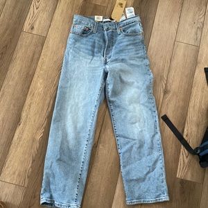Levi's Women's Ribcage Straight Ankle Jeans in color - worn out